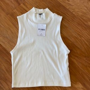 turtle neck crop neck. size L.